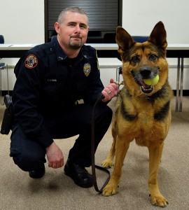 Officer Chad Lehman poses with Rex