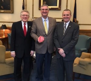 Mayor Jim Lienhoop, Gov. Eric Holcomb and State Rep. Milo Smith; photo courtesy of City of Columbus