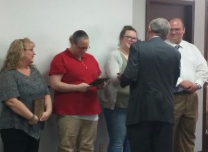 Five Bartholomew County dispatchers and a former dispatcher were honored by county officials at a ceremony Monday.