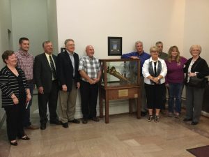 Bartholomew County officials held an unveiling of the new bicentennial torch display case at the county courthouse Friday.