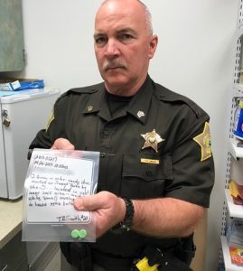 Deputy T. A. Smith displays samples of the candy. Photo courtesy of Bartholomew Co. Sheriff's Dept.